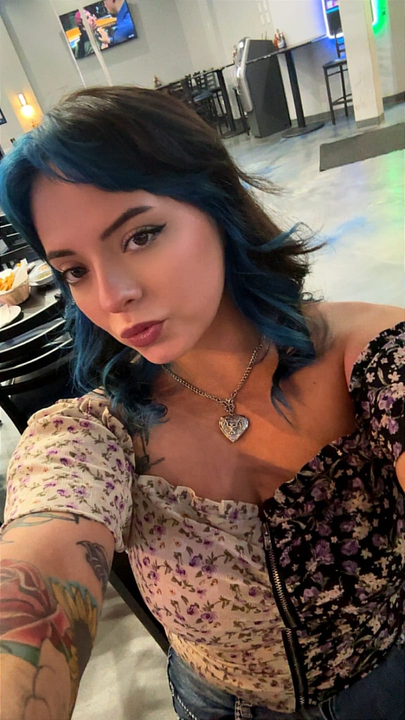 Customer photo review of Bat Locket Necklace