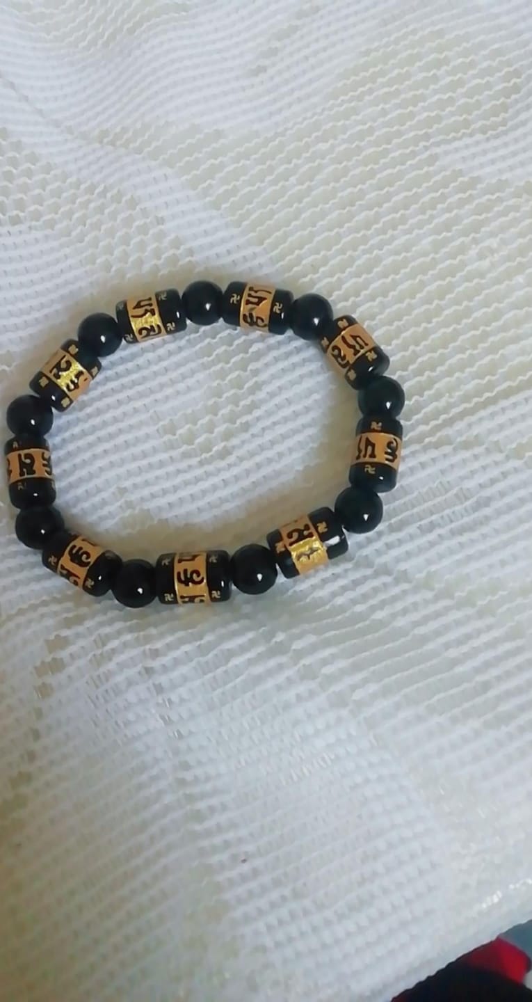 Customer photo review of FuAttract Protection Luck & Prosperity Colorful Om Mani Mantra Fortune Money Bracelet