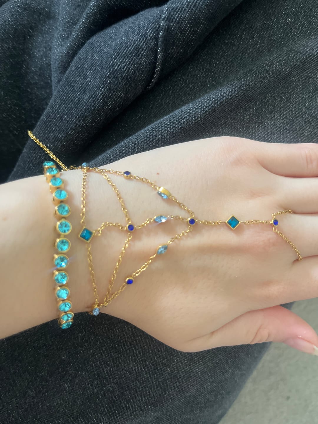 Customer photo review of Kareena Gold Blue Hand Chain