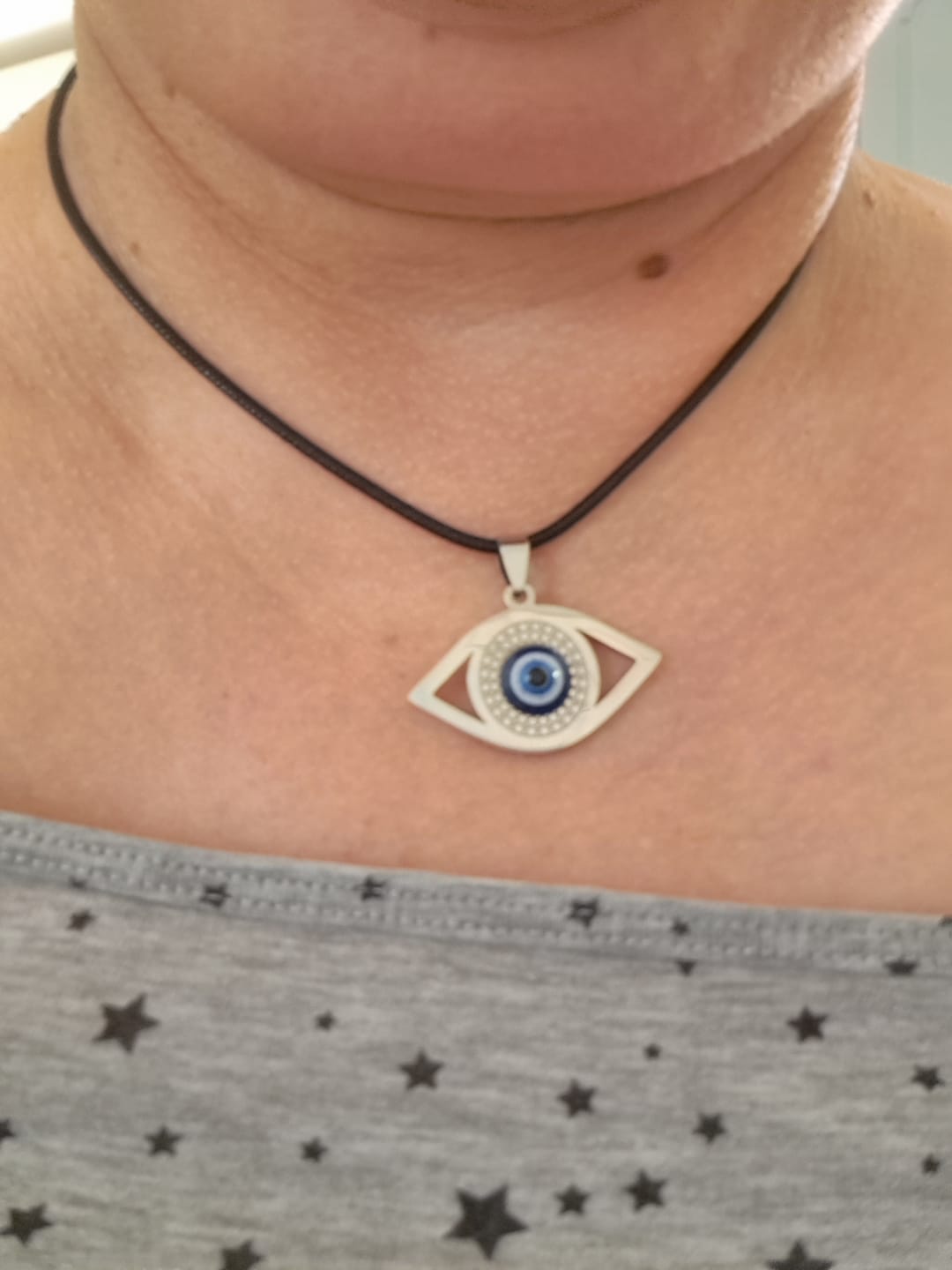 Customer photo review of Pendentif Oeil Bleu - Protection Symbolique du Mauvais Oeil