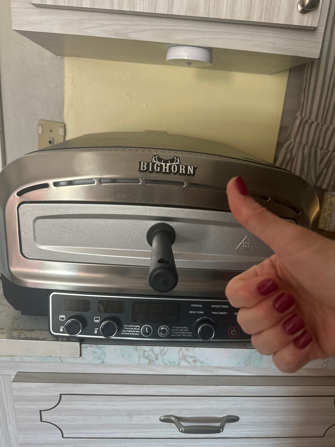 Customer photo review of 14" Indoor Electric Countertop Pizza Oven with 6 Preset Modes, Stainless Steel