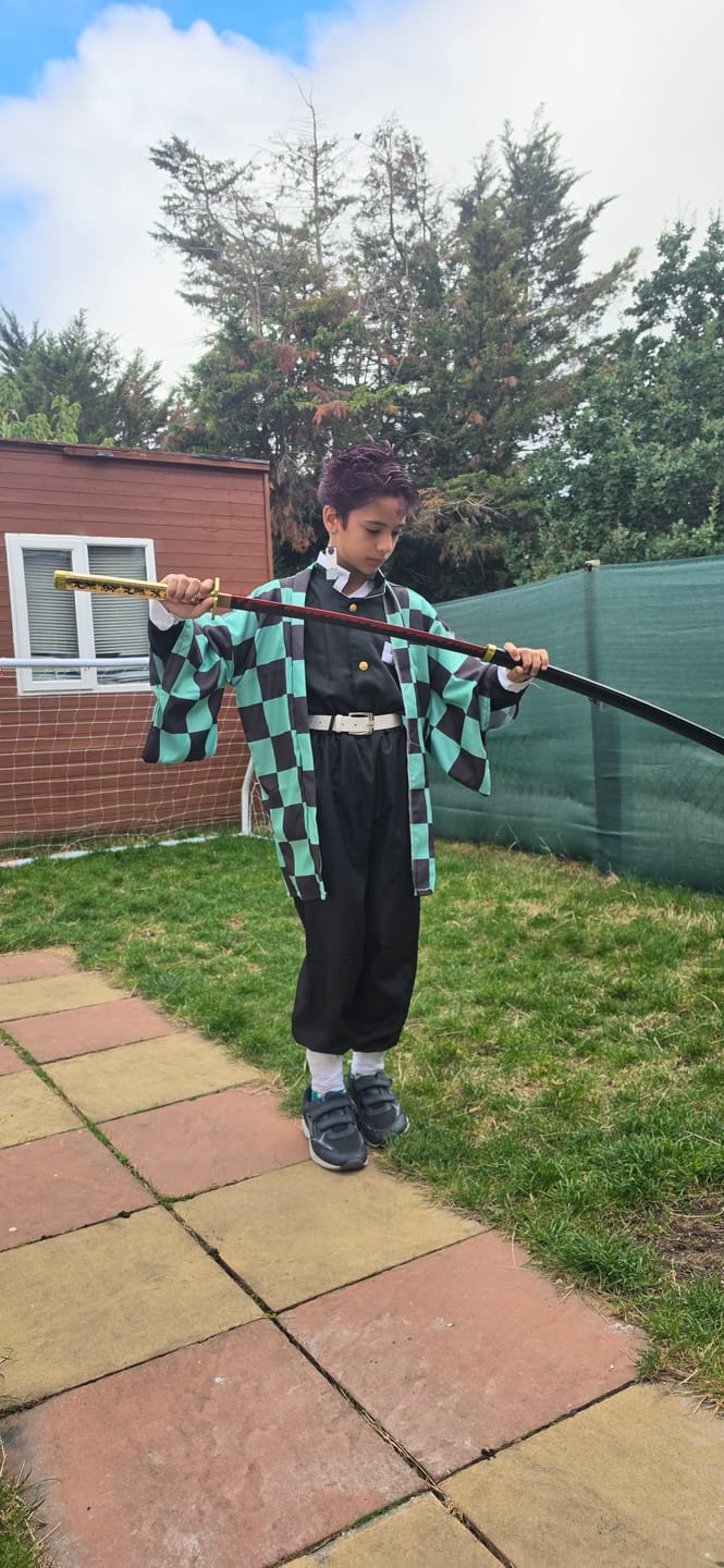 Customer photo review of Demon Slayer Tsugikuni Yoriichi Wooden Katana Bamboo Sword
