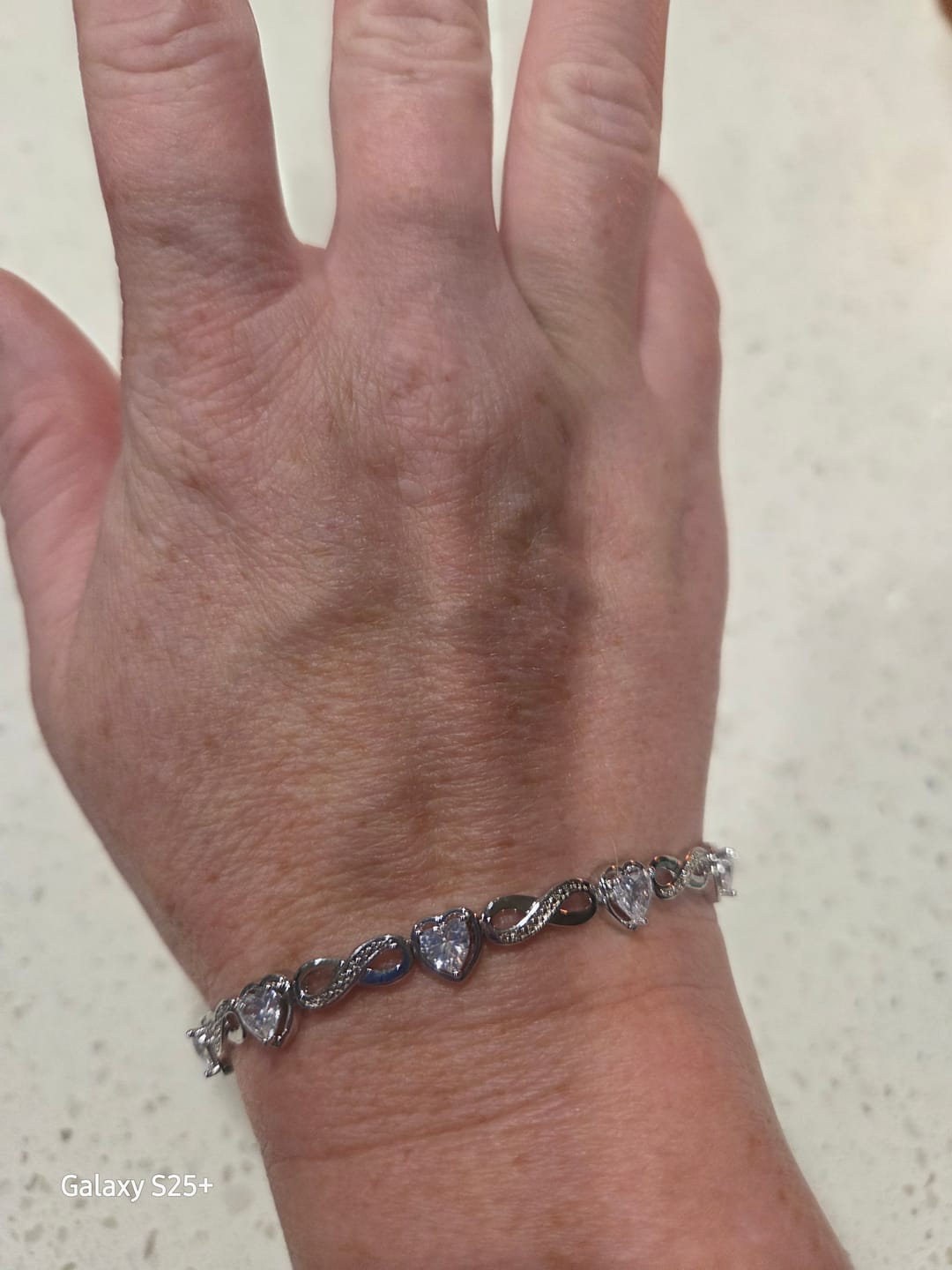 Customer photo review of Amanda 18k White Gold Plated Infinity Heart Tennis Bracelet with Simulated Diamond Crystals