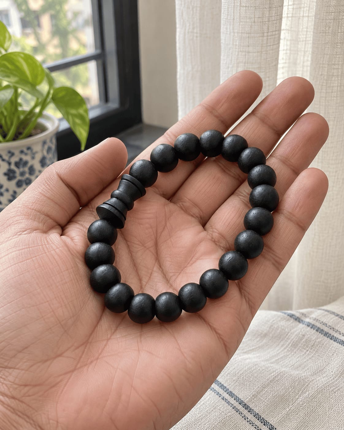 Customer photo review of Karungali Damru Bracelet