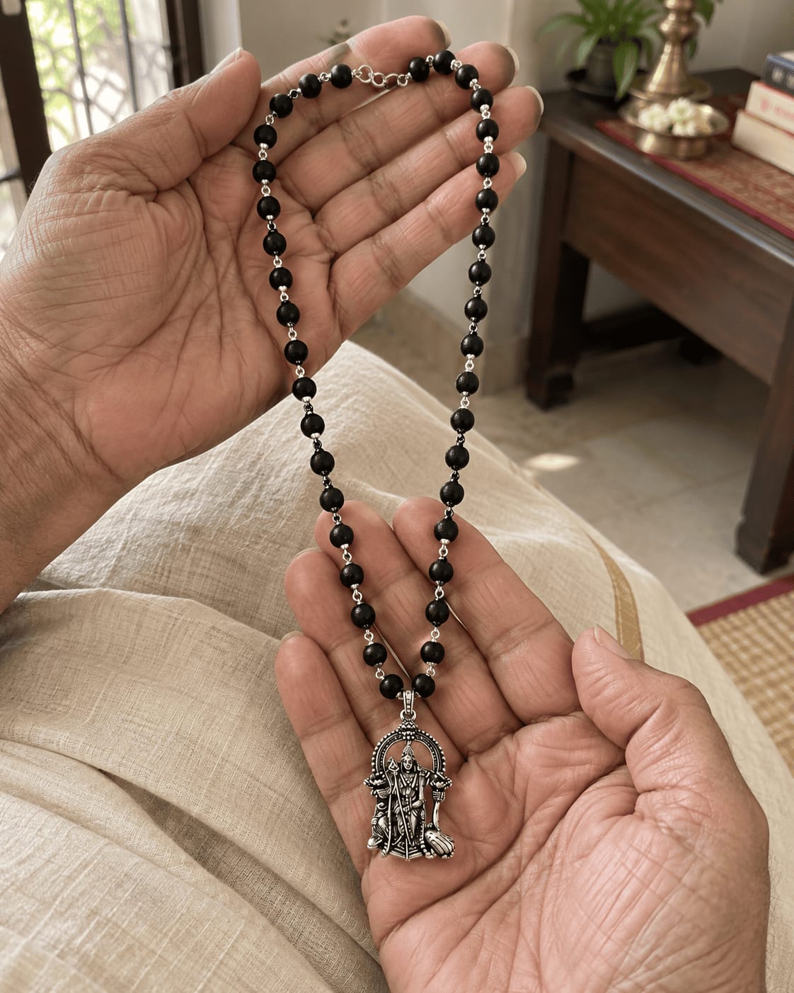 Customer photo review of Original Karungali Mala with Silver Plated Lord Murugan Pendant
