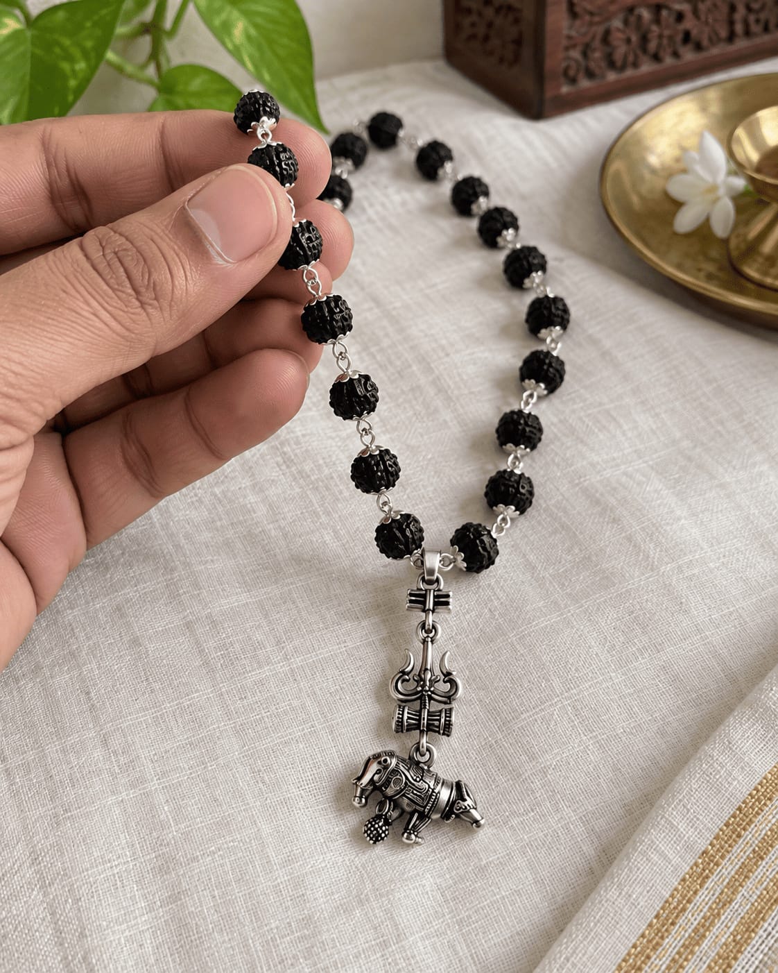 Customer photo review of Original Silver-Plated Karungali Mala with Shiv Trishul Nandi Pendant