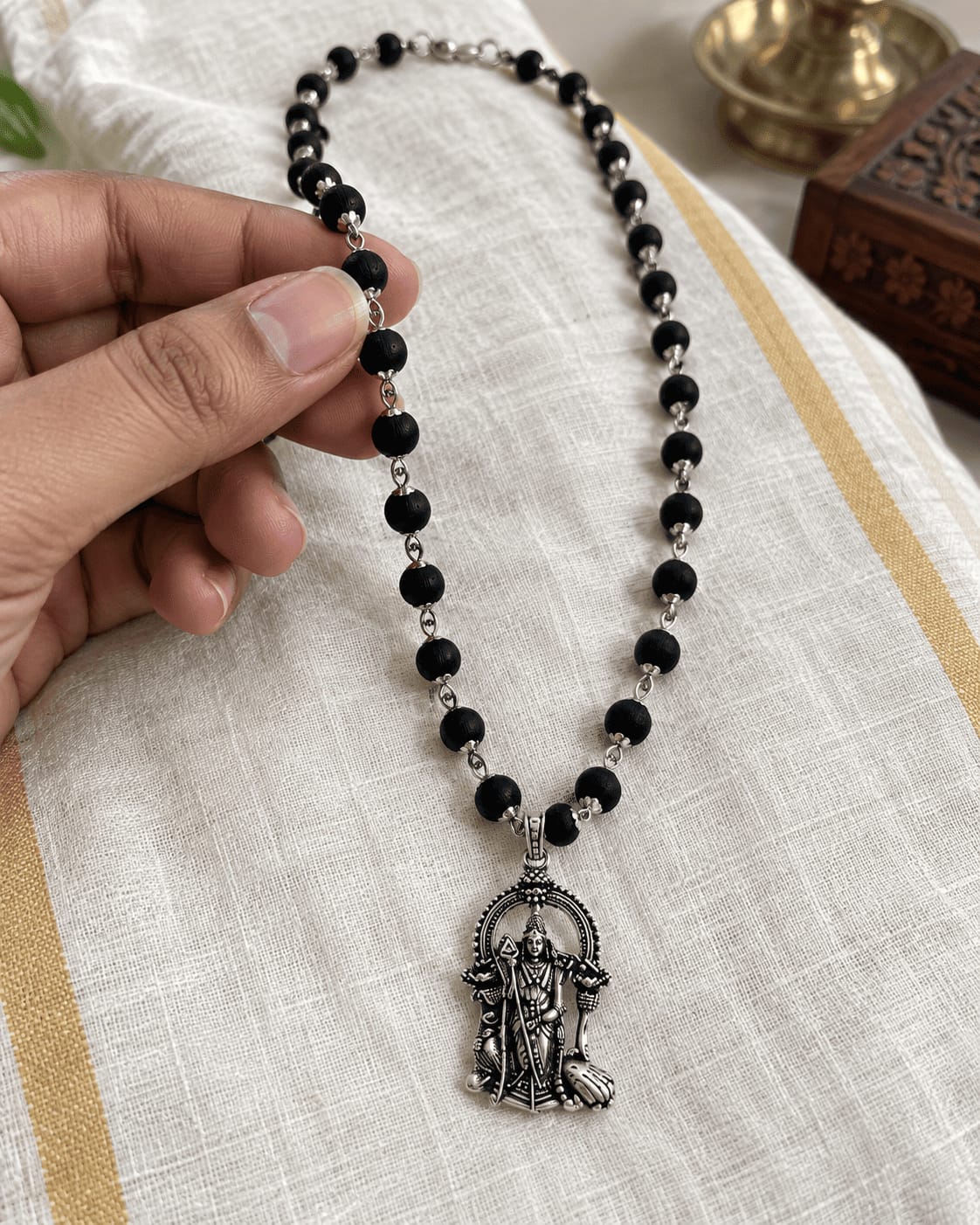 Customer photo review of Original Karungali Mala with Silver Plated Lord Murugan Pendant