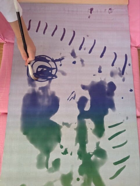 Customer photo review of Magic Drew Colorful Reusable Water Writing Cloth [FREE Water Cup + Brush]