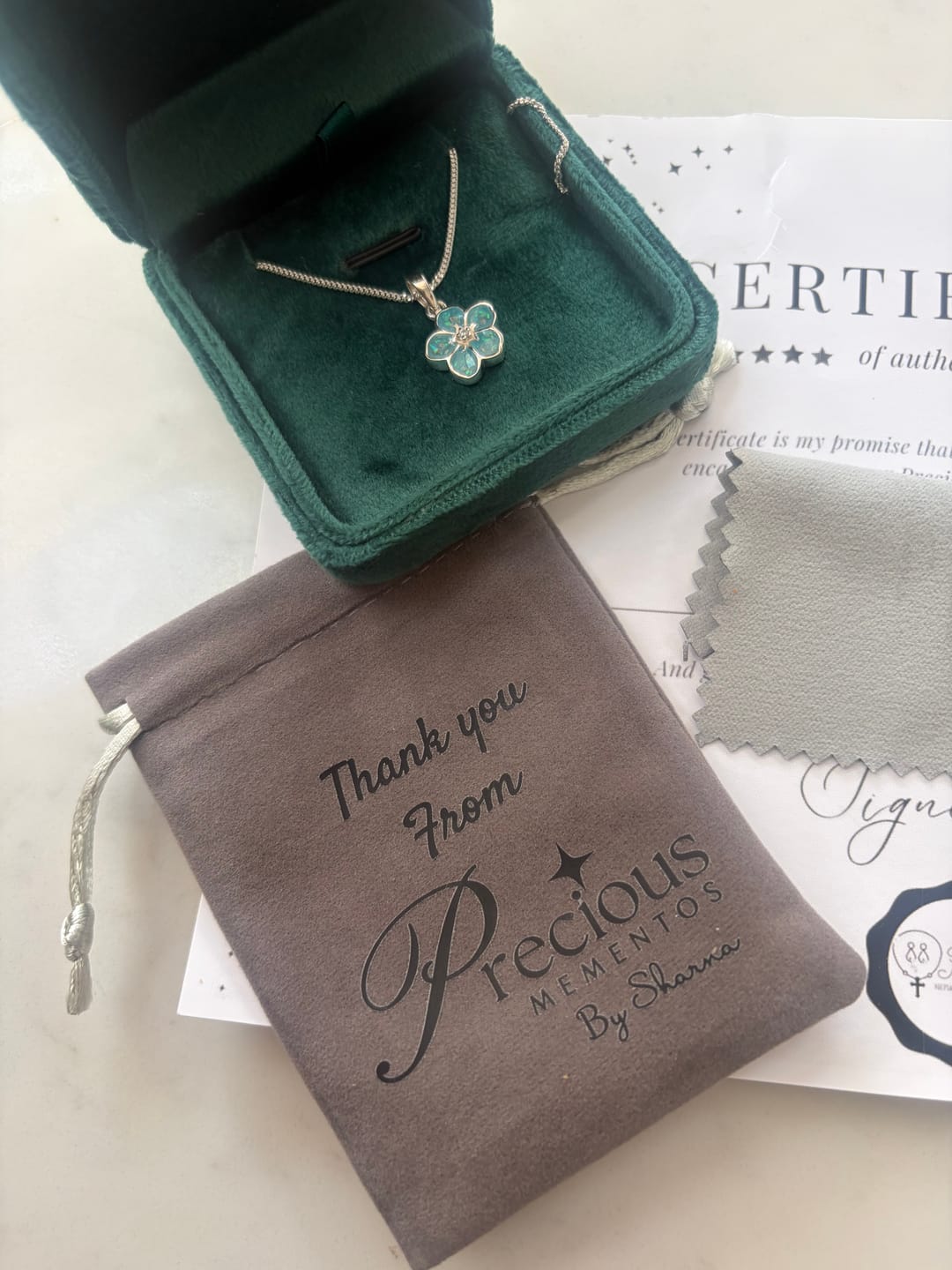 Customer photo review of Flower Sparkle Cubic Zirconia Keepsake Pendant