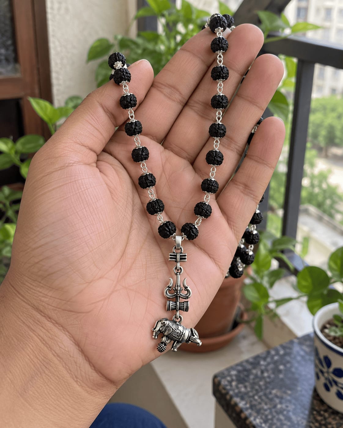 Customer photo review of Original Silver-Plated Karungali Mala with Shiv Trishul Nandi Pendant