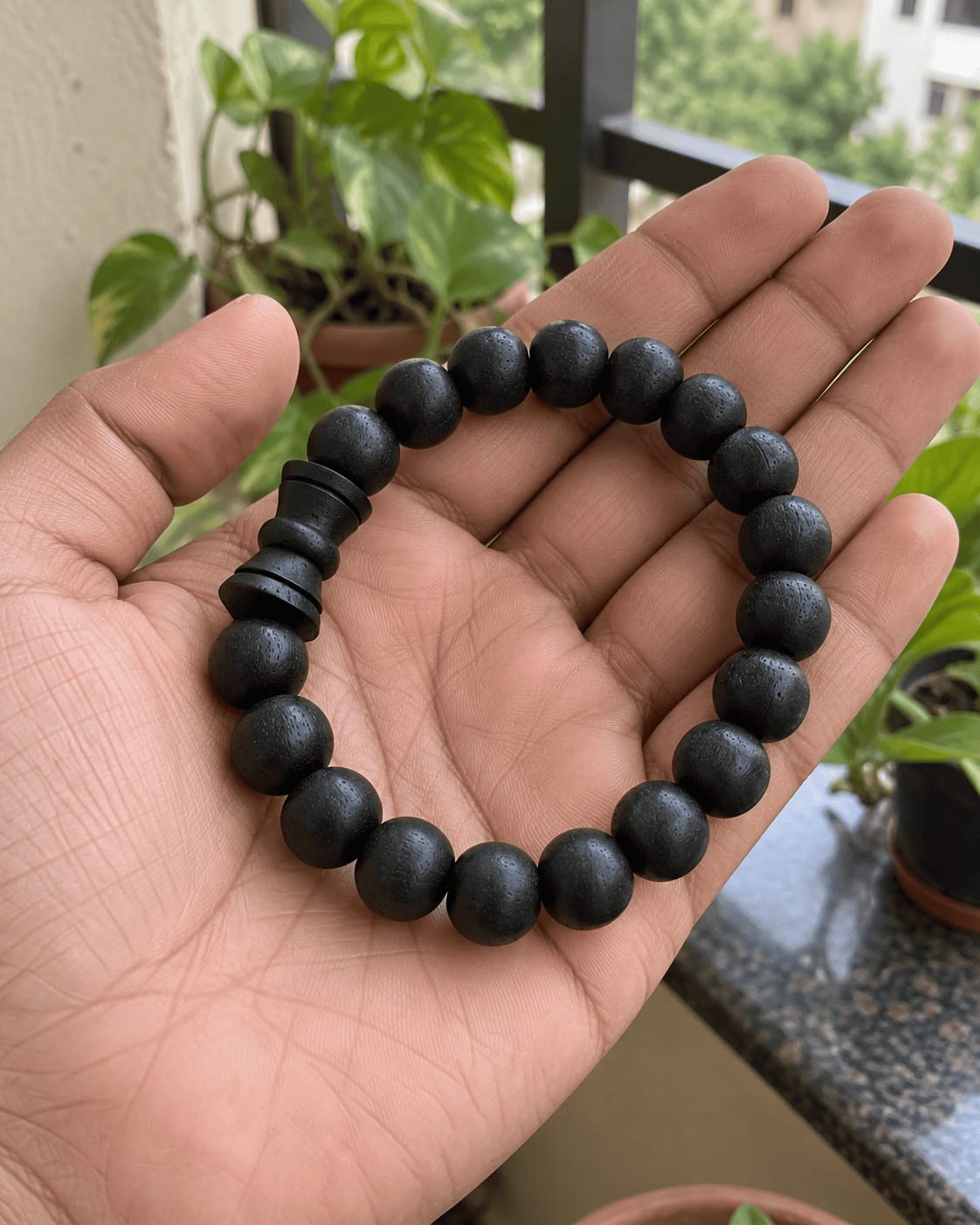 Customer photo review of Karungali Damru Bracelet