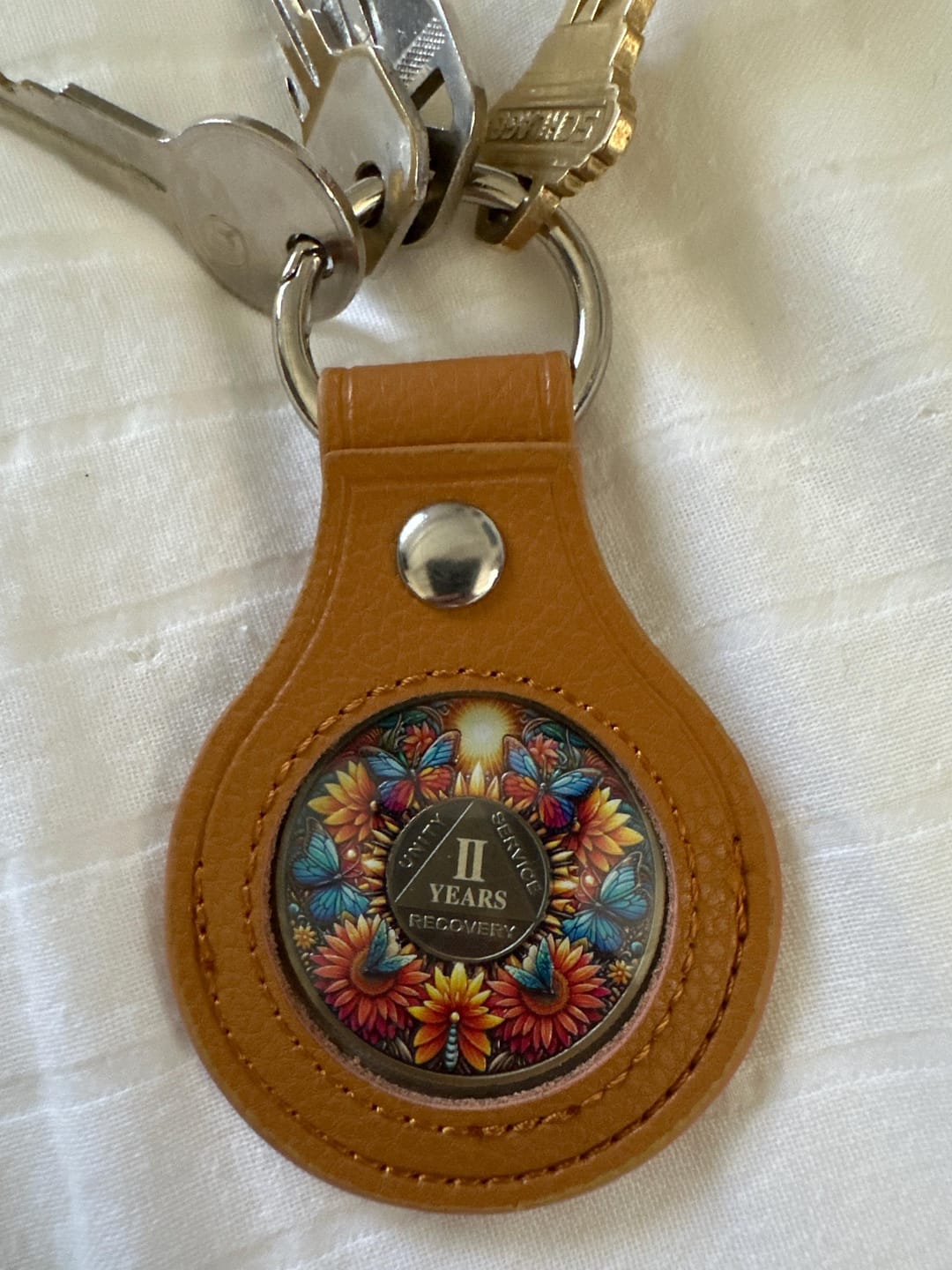 Customer photo review of Handmade Leather Sobriety Coin Holder Keychain