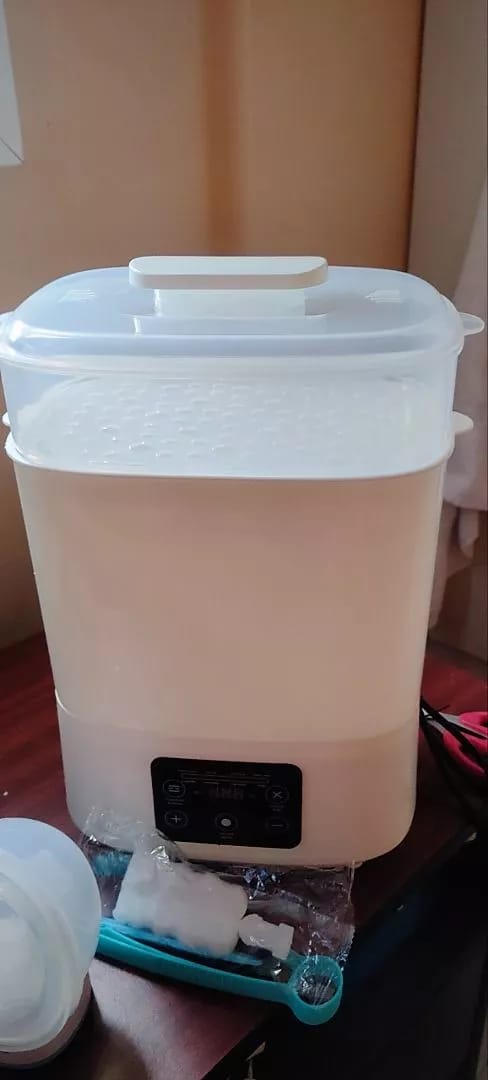 Customer photo review of 5 in 1 Baby Bottle Sterilizer With Drying Bottle Heater Capacity Auto Shut-Off