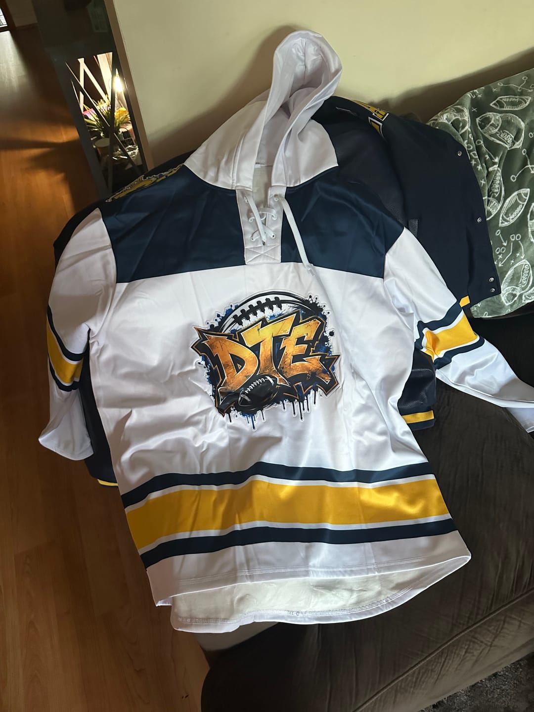 Customer photo review of Custom White Navy Raglan Sleeves Lace-Up Neck Breathable Hockey Hoodie Jersey