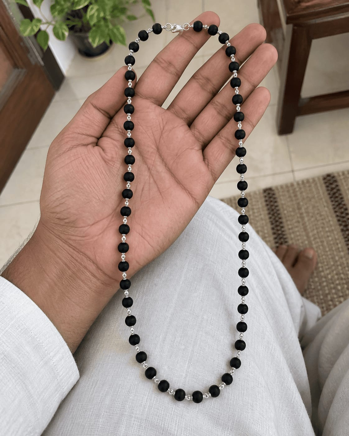 Customer photo review of Karungali Mala with Silver-Plated Chain