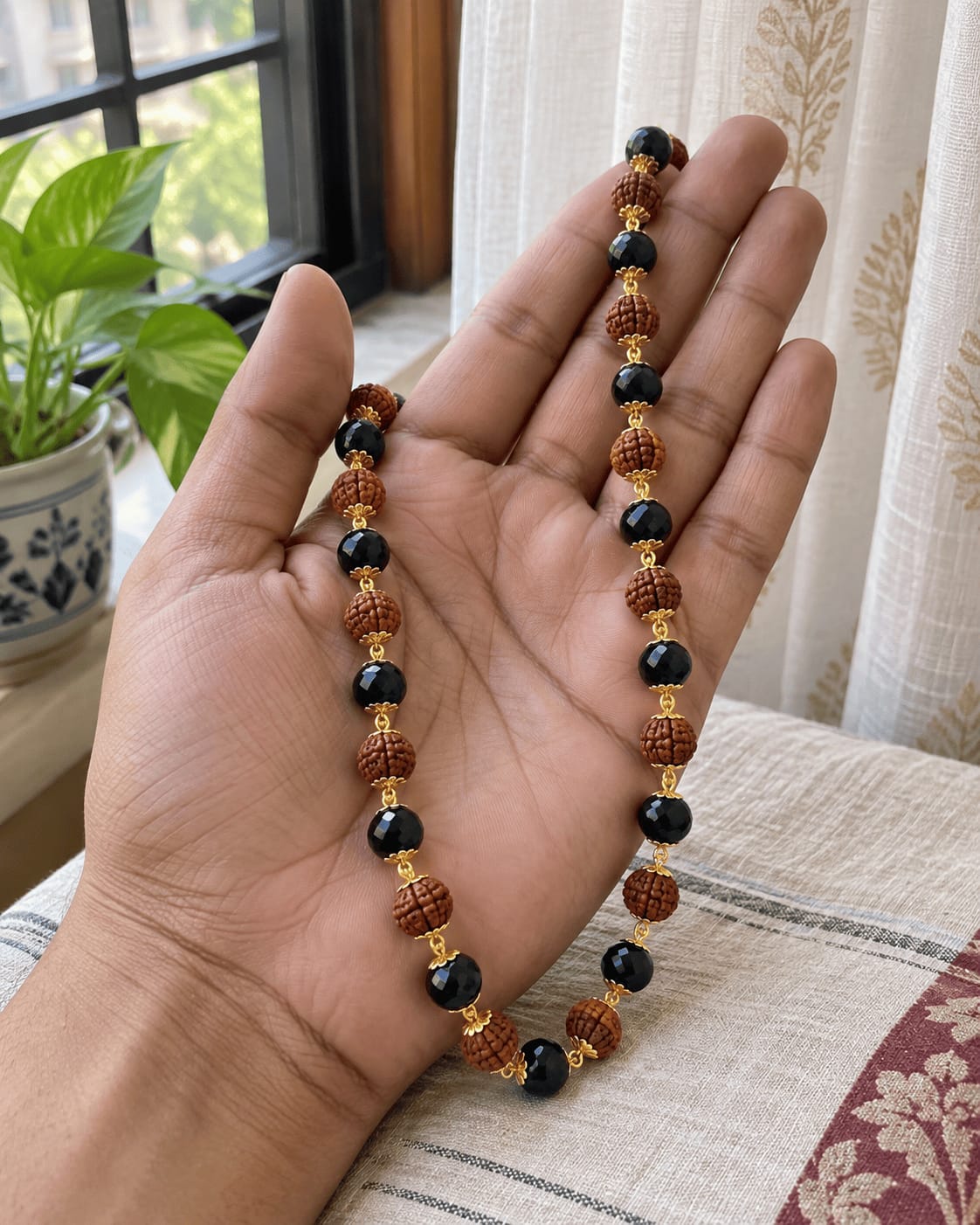 Customer photo review of Gold Plated Karungali & Rudraksha Premium Mala
