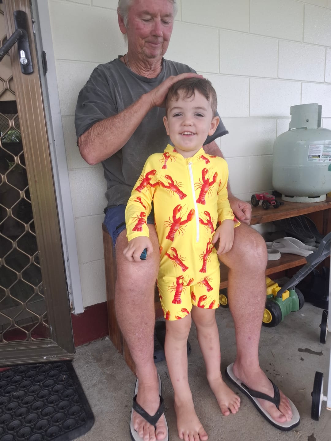 Customer photo review of Bright Lobster Unisex Long Sleeve Zip Swimmers