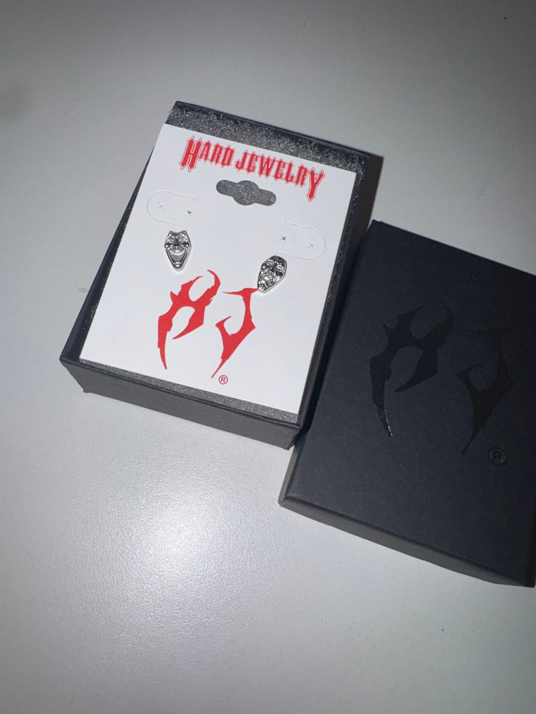 Customer photo review of LAUGH NOW, CRY LATER STUD EARRINGS