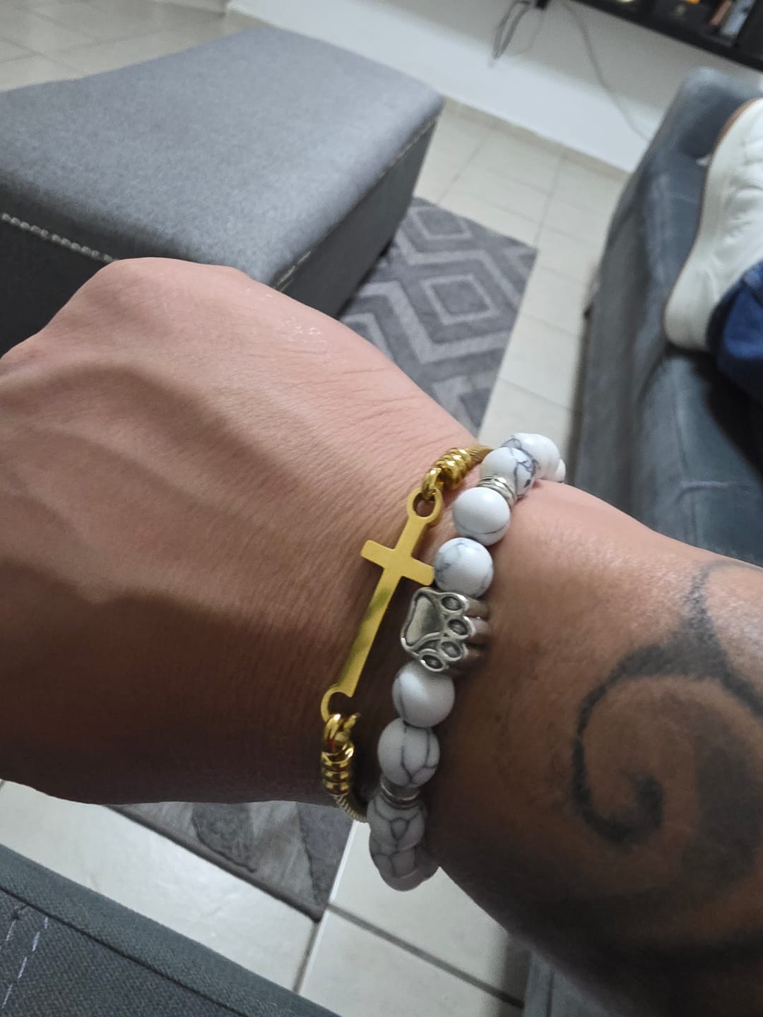 Customer photo review of Christianartworkshop Twisted Cable Bangle with Polished Cross Bar Clasp Bracelet: A Symbol of Sacred Redemptive Grace