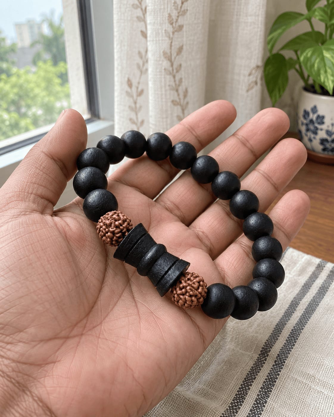 Customer photo review of Karungali Rudraksha Damru Bracelet