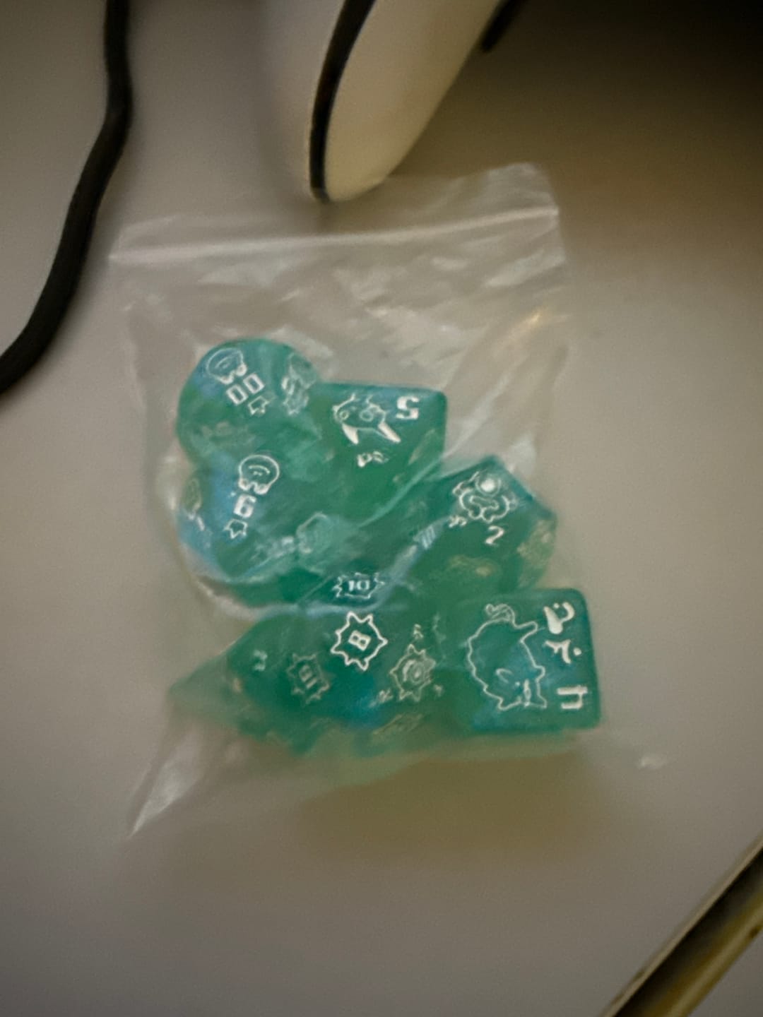 Customer photo review of Obojima Mystery Dice – Unique Custom-Molded DND Dice – Mystery 1 Pack