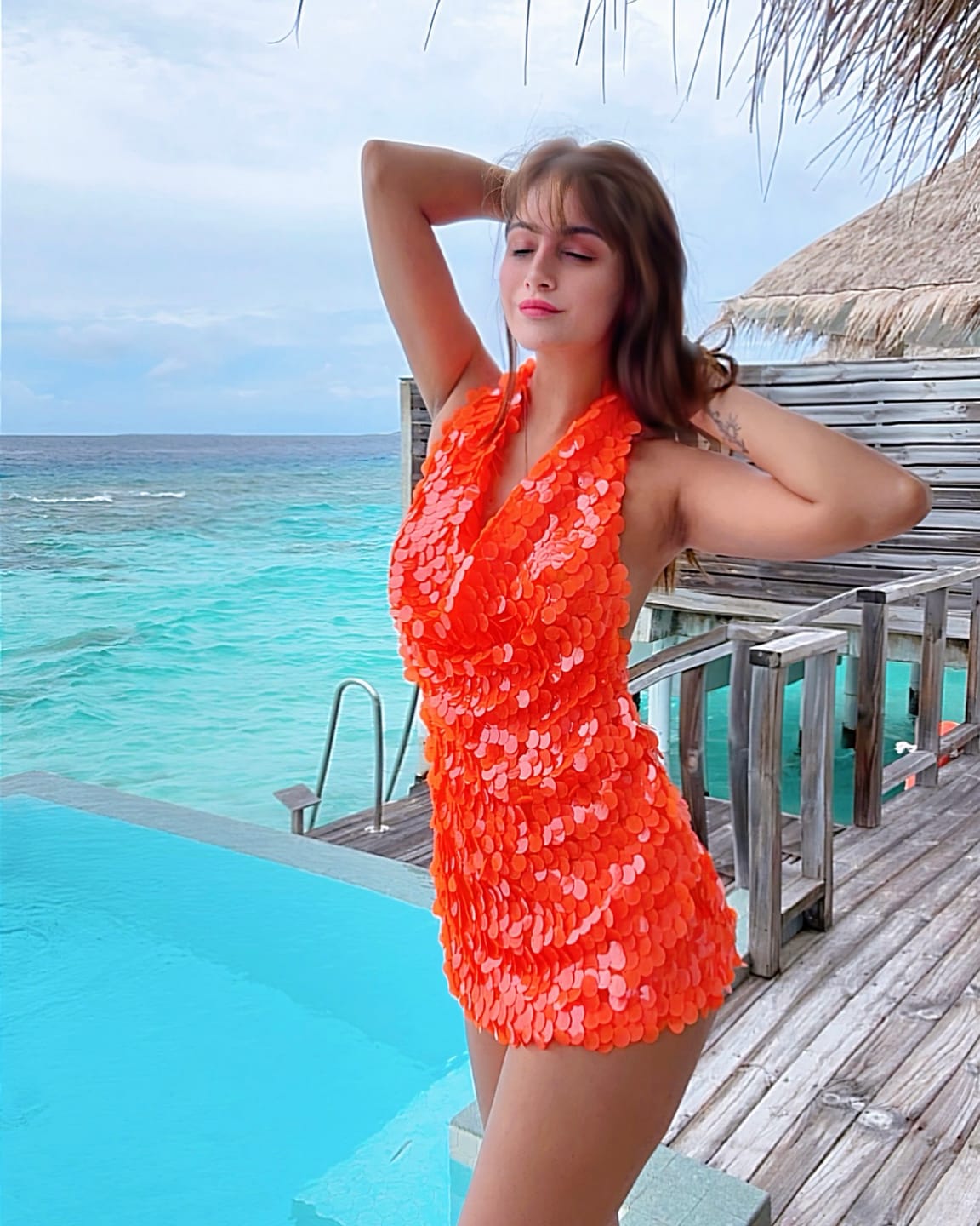 Customer photo review of Edith Backless Sequin Mini Dress