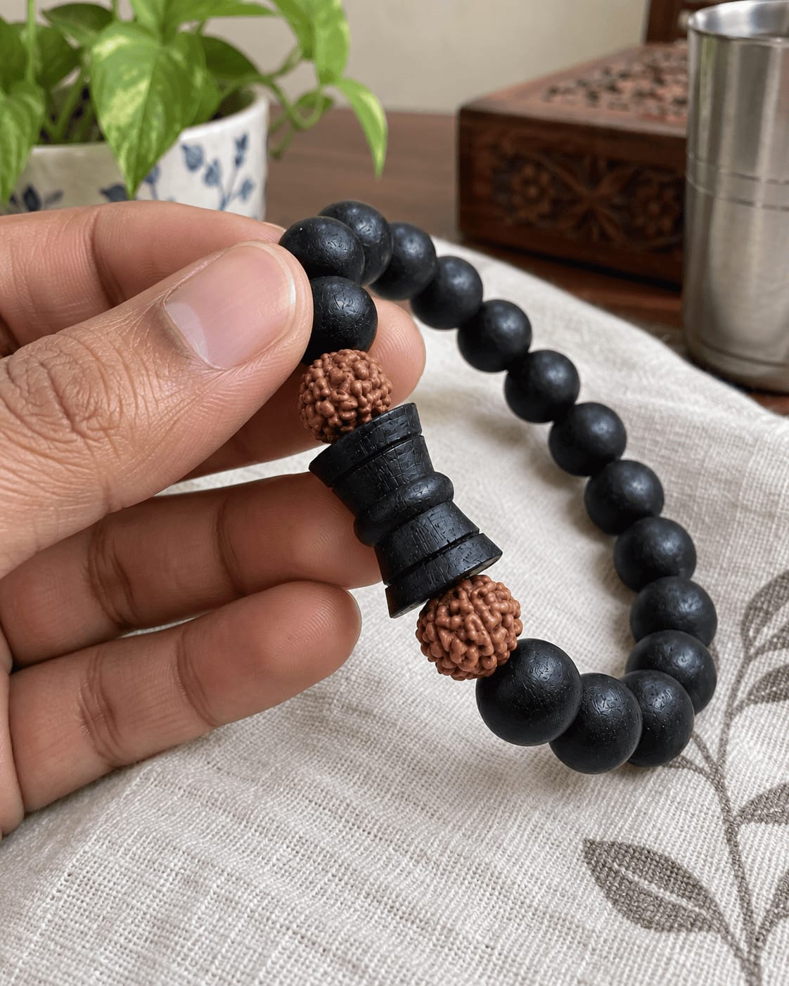 Customer photo review of Karungali Rudraksha Damru Bracelet