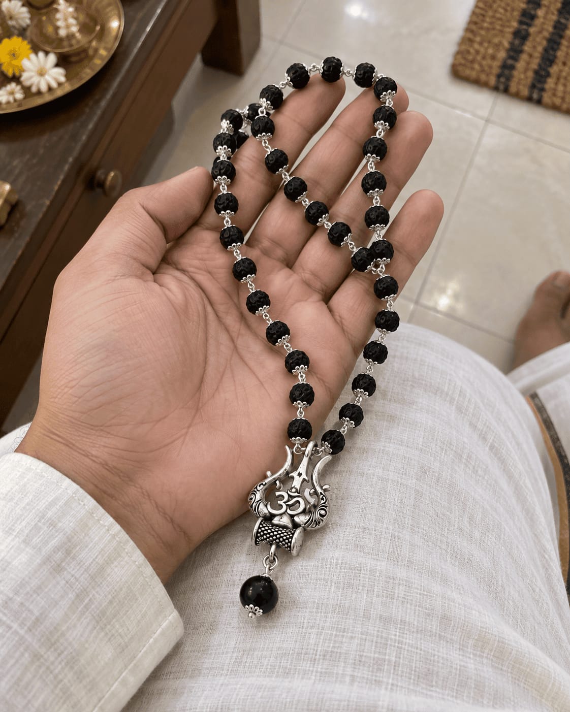 Customer photo review of Original Karungali Mala with Silver Plated Om Trishul Pendant