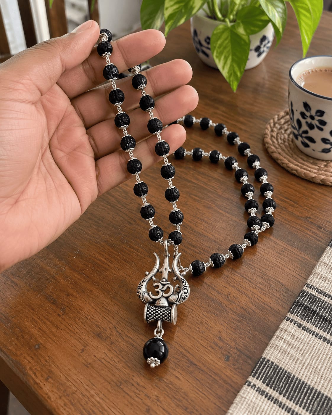 Customer photo review of Original Karungali Mala with Silver Plated Om Trishul Pendant