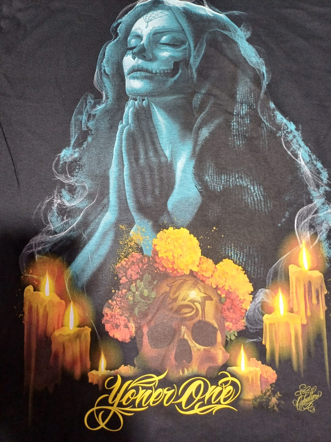 Customer photo review of Ofrenda Tee