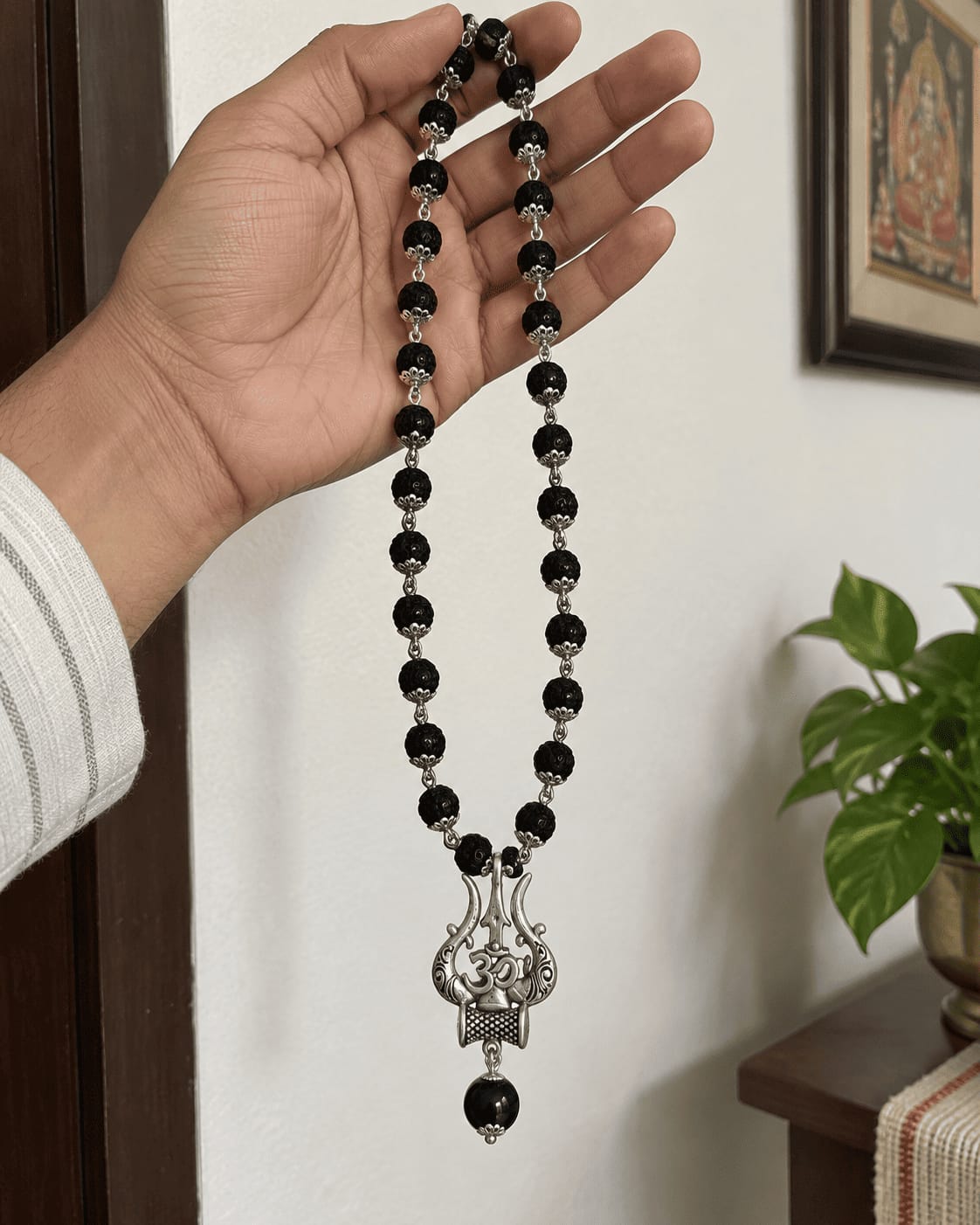 Customer photo review of Original Karungali Mala with Silver Plated Om Trishul Pendant