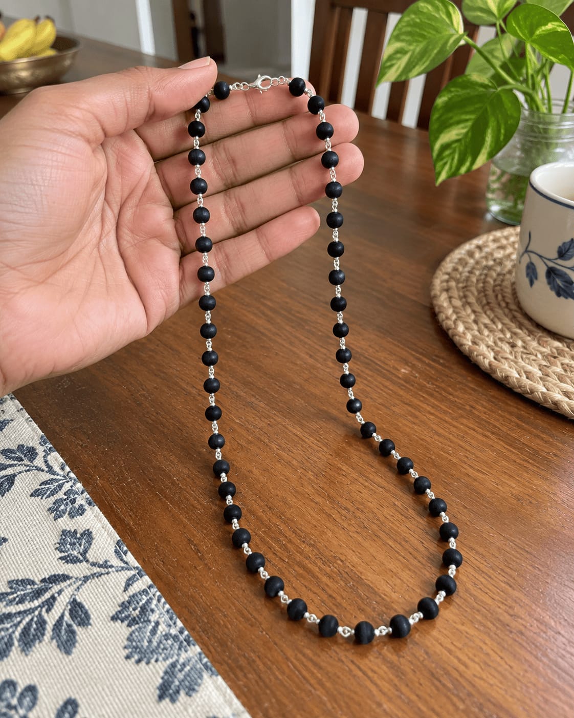 Customer photo review of Karungali Mala with Silver-Plated Chain
