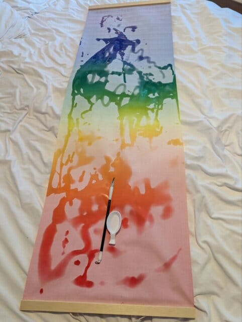 Customer photo review of Magic Drew Colorful Reusable Water Writing Cloth [FREE Water Cup + Brush]