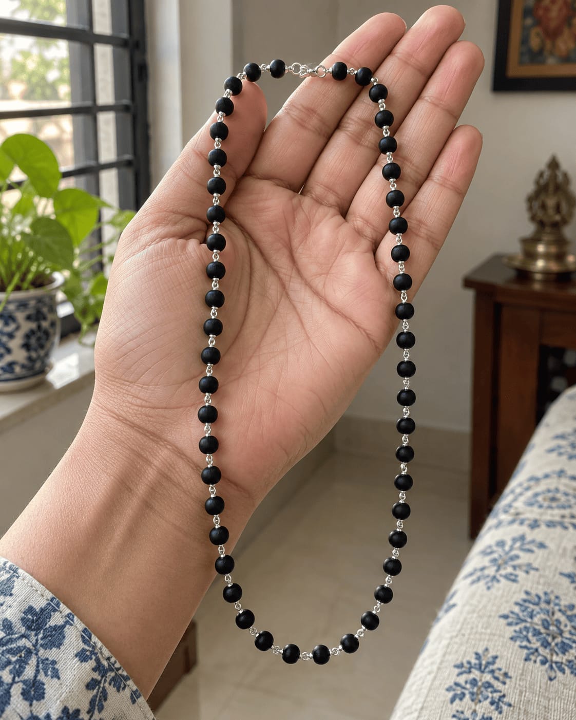 Customer photo review of Karungali Mala with Silver-Plated Chain