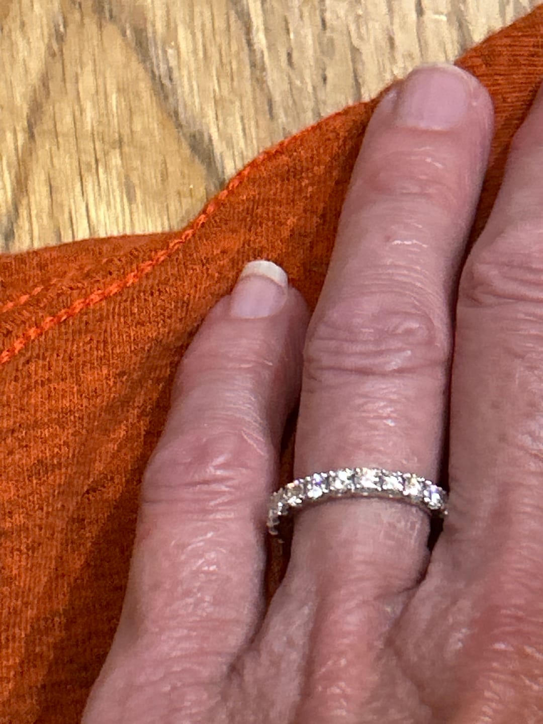 Customer photo review of Pave Moissanite Eternity Wedding Band Ring In Sterling Silver