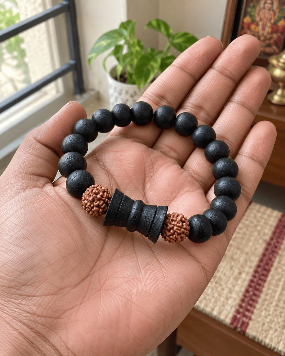 Customer photo review of Karungali Rudraksha Damru Bracelet