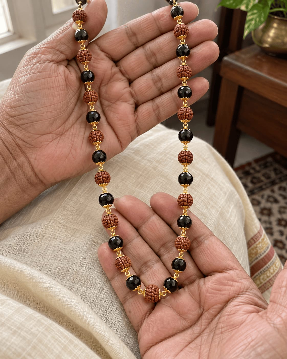 Customer photo review of Gold Plated Karungali & Rudraksha Premium Mala