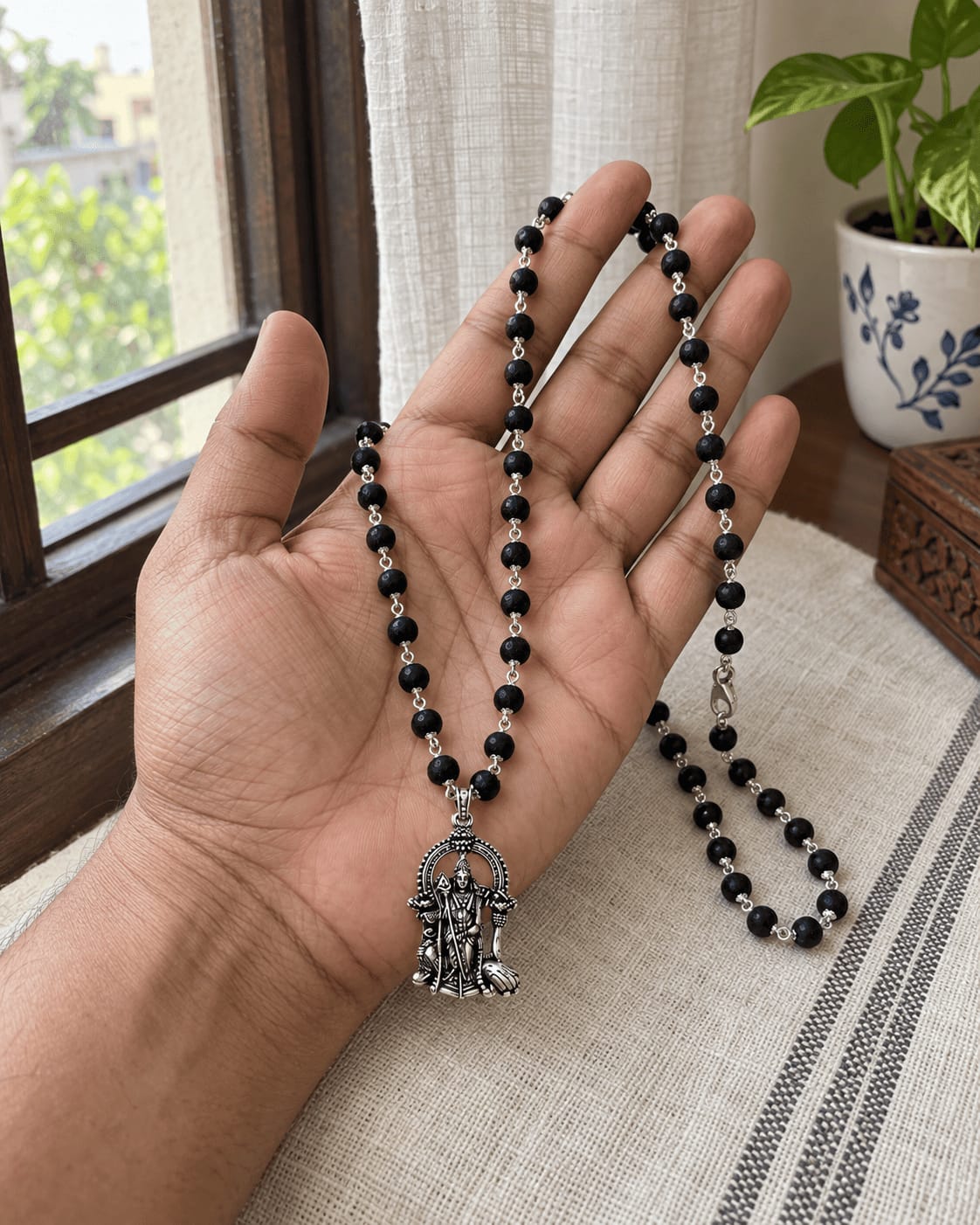 Customer photo review of Original Karungali Mala with Silver Plated Lord Murugan Pendant