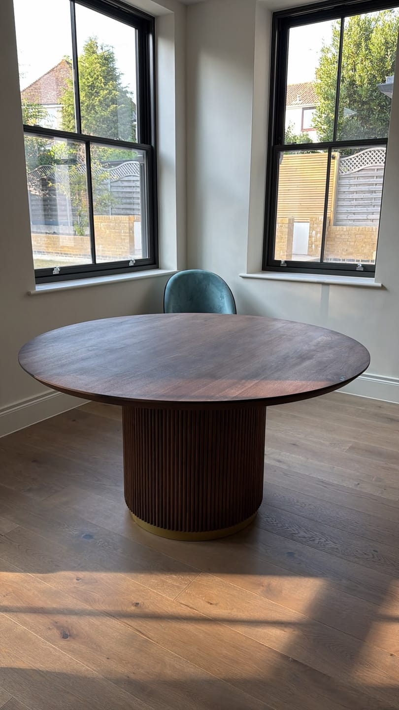 Customer photo review of Chiara Extendable Walnut Round Dining Table