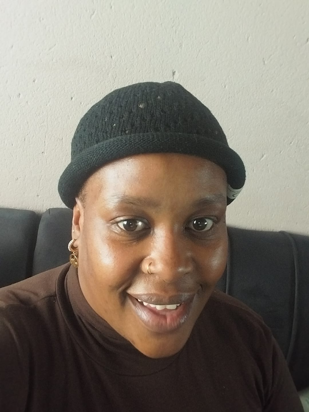 Customer photo review of Gold Precious Logo Earrings