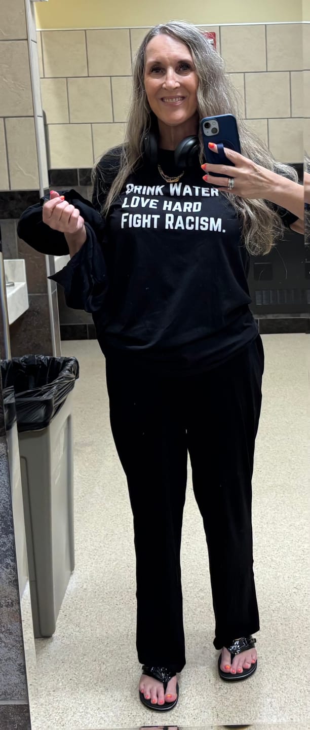 Customer photo review of Drink Water Fight Racism Unisex T-shirt