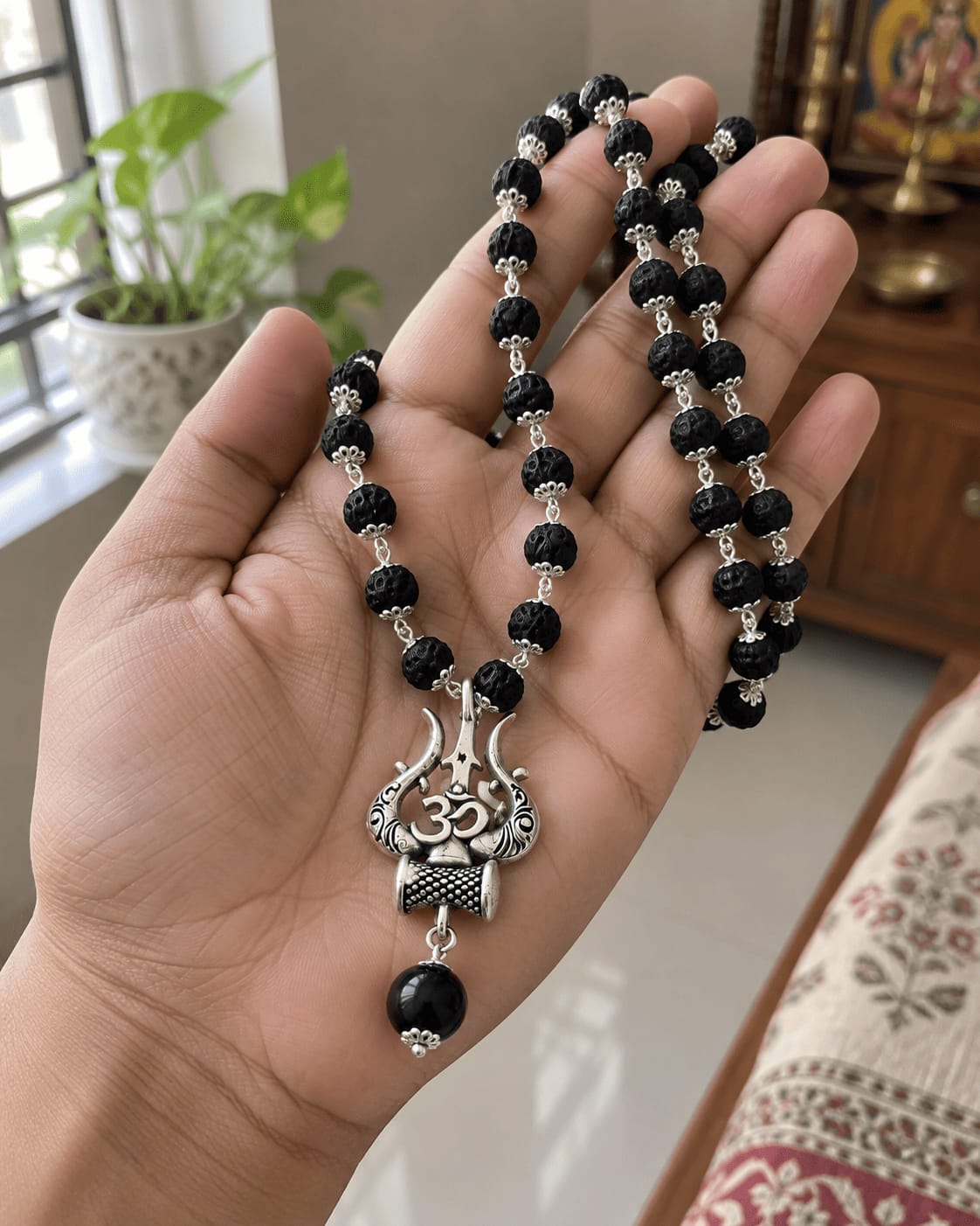 Customer photo review of Original Karungali Mala with Silver Plated Om Trishul Pendant