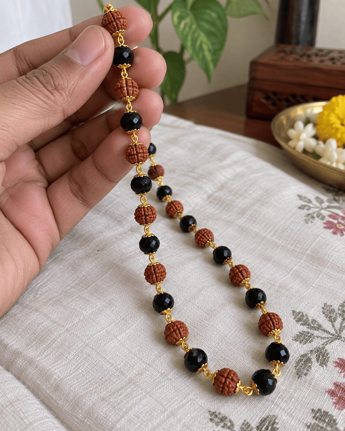 Customer photo review of Gold Plated Karungali & Rudraksha Premium Mala
