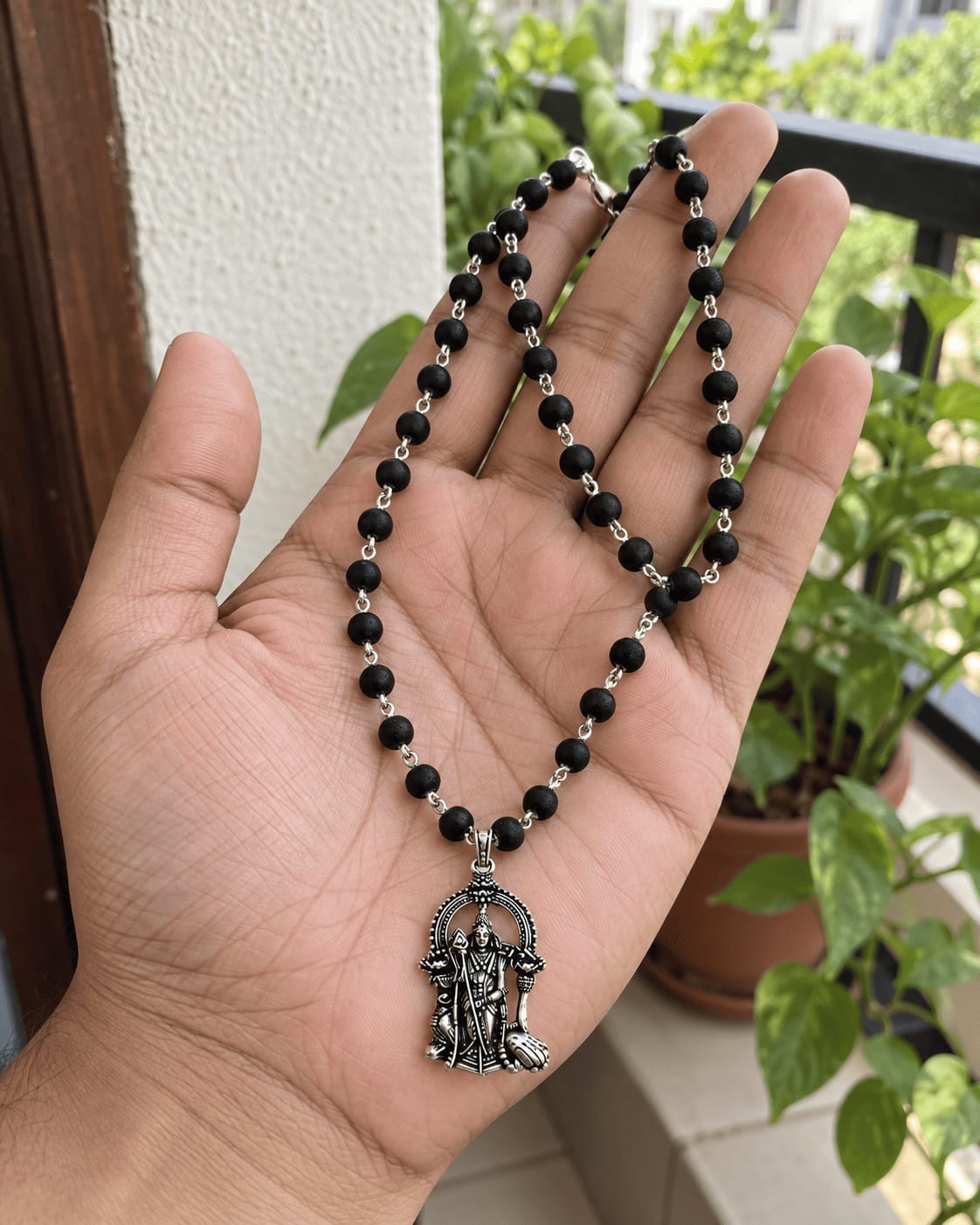 Customer photo review of Original Karungali Mala with Silver Plated Lord Murugan Pendant