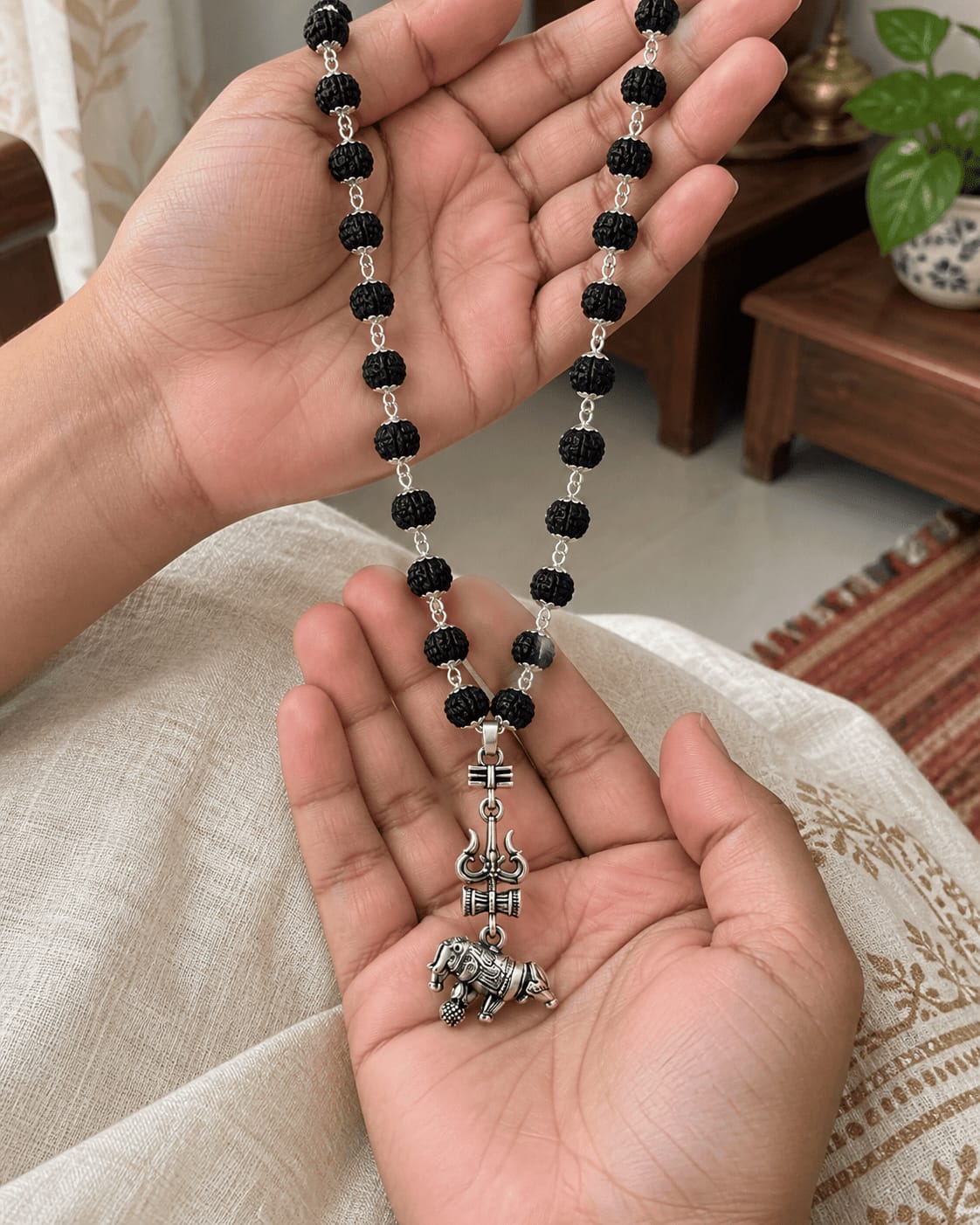 Customer photo review of Original Silver-Plated Karungali Mala with Shiv Trishul Nandi Pendant