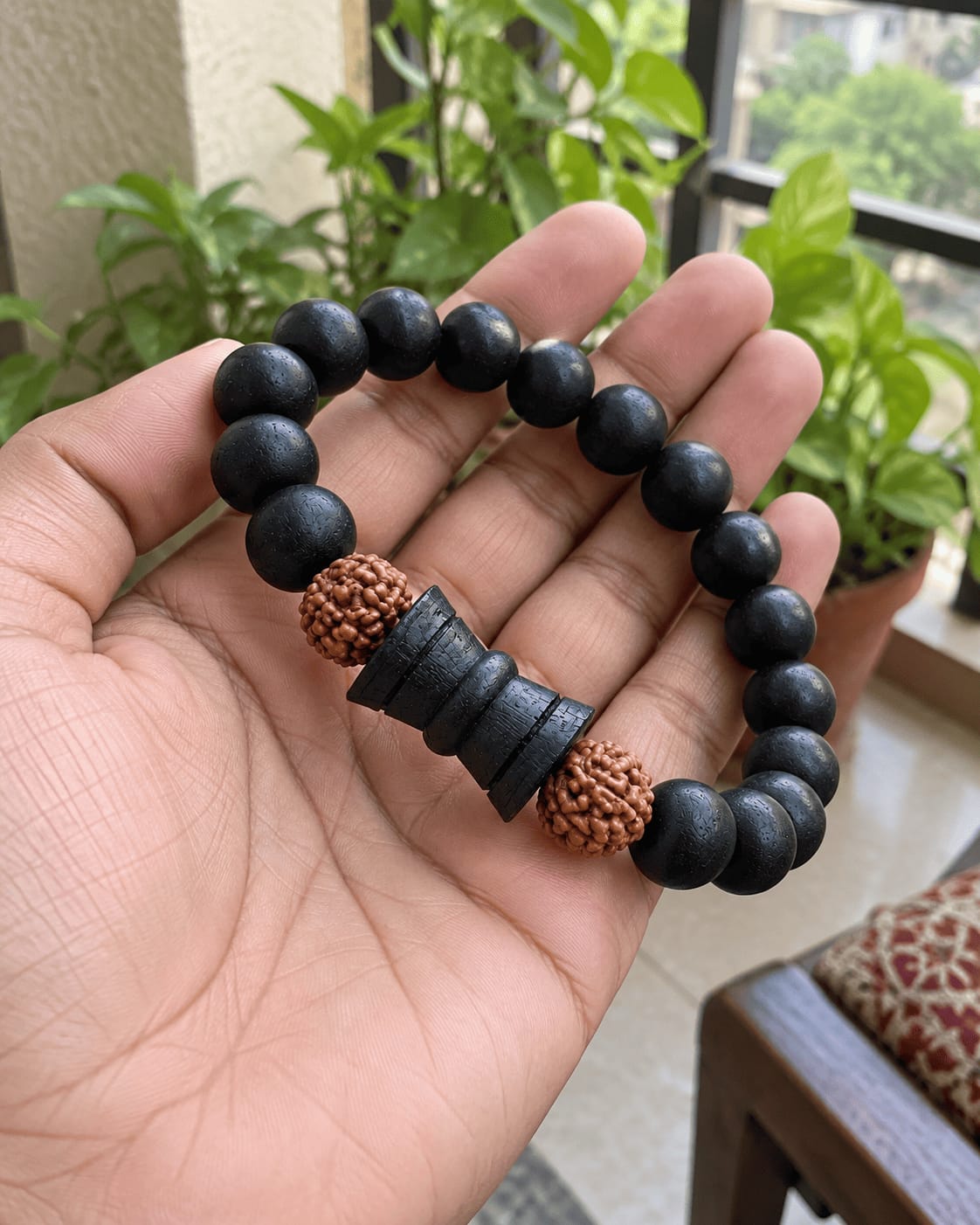 Customer photo review of Karungali Rudraksha Damru Bracelet