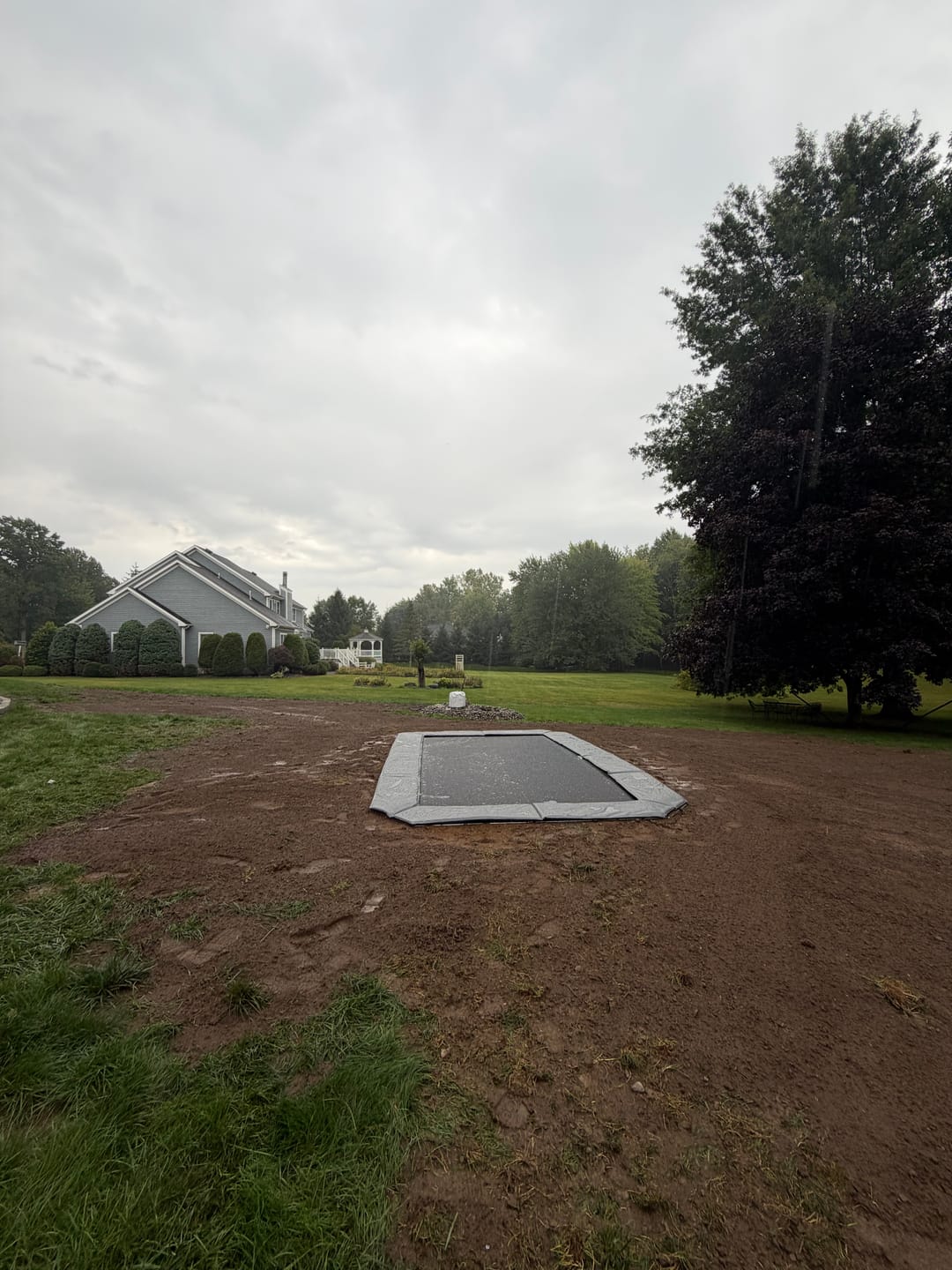 Customer photo review of Ultimate Bundle! 10'x17' Rectangle Pro-Line In-ground Trampoline + LED Lights + Hoop
