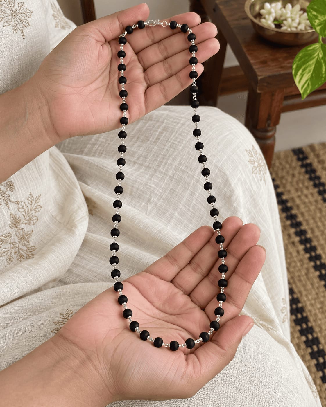 Customer photo review of Karungali Mala with Silver-Plated Chain