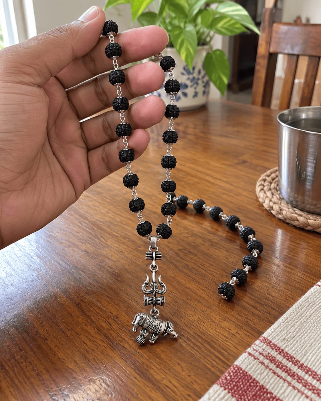 Customer photo review of Original Silver-Plated Karungali Mala with Shiv Trishul Nandi Pendant