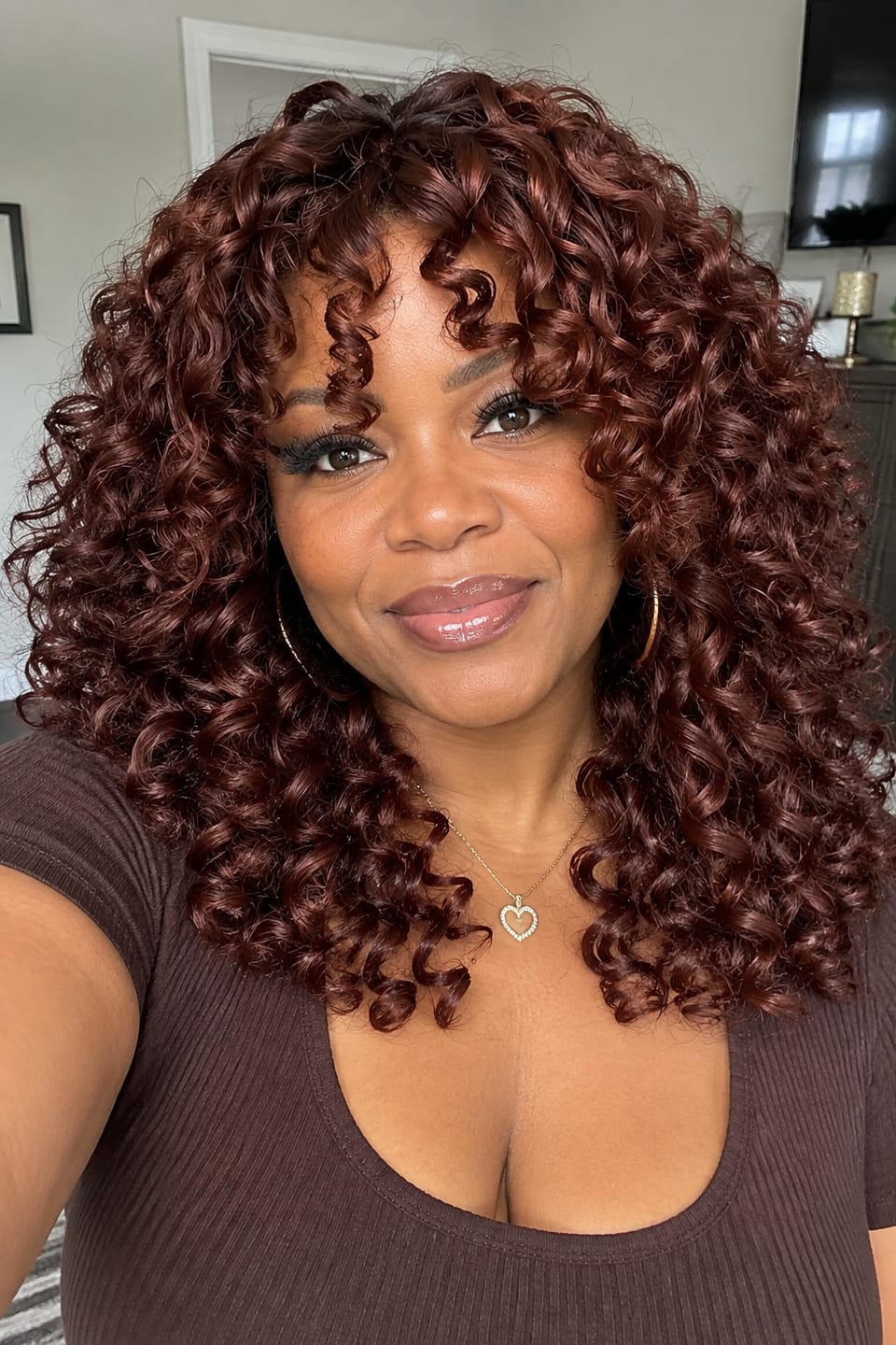 Customer photo review of Luvwin Reddish Brown Curly Bang Wig With Natural Black Root No Lace Easy To Go Wig